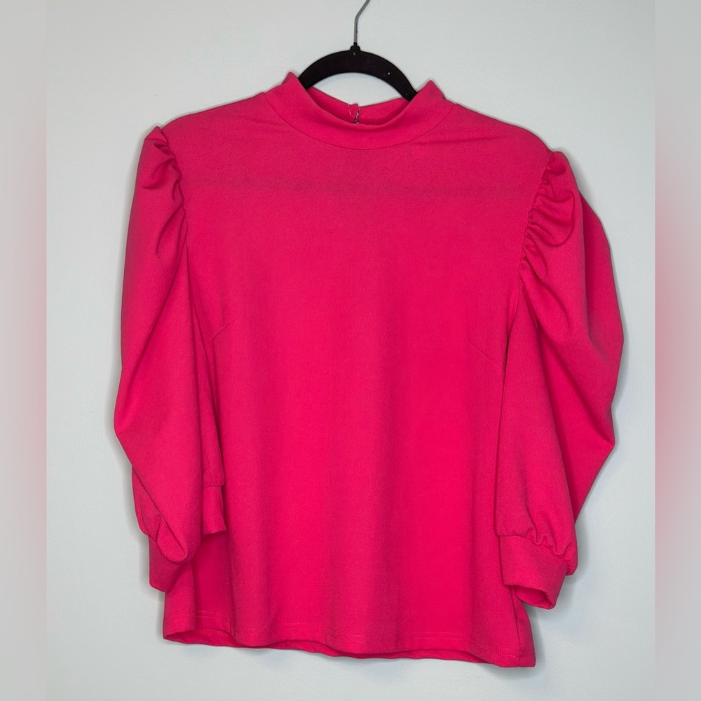 Hot pink mock neck short sleeve with puff.